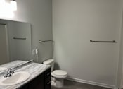 Thumbnail 15 of 15 - a bathroom with a sink and a toilet
