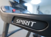 Thumbnail 16 of 38 - A close up of a black treadmill with the word "SPIRIT" on the side.