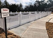 Thumbnail 7 of 8 - A white picket fence surrounds the Fairfield Community Garden.