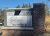 Thumbnail 1 of 9 - A street sign for 12th Ave and Waymon Blvd is shown.
