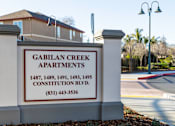 Thumbnail 51 of 53 - A sign for Gabilan Creek Apartments with a phone number on it.