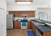 Thumbnail 4 of 44 - Fully Equipped Kitchen at Mosaic on the River Apartments, Richland, Washington