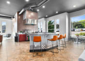 Thumbnail 32 of 44 - Clubhouse Kitchen at Mosaic on the River Apartments, Washington