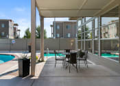 Thumbnail 41 of 44 - Poolside Relaxing Chairs at Mosaic on the River Apartments, Richland, WA, 99352