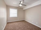 Thumbnail 15 of 60 - Carpeted Bedroom at Cleo Apartments, Alabama, 35611