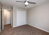 Thumbnail 23 of 60 - Bedroom With Ceiling Fan at Cleo Apartments, Alabama, 35611