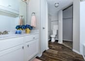 Thumbnail 15 of 16 - a bathroom with a sink and a toilet at The Davis Apartments, Huntsville, AL 35816  