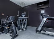 Thumbnail 11 of 16 - the gym has plenty of exercise equipment in it at The Davis Apartments, Huntsville Alabama  