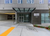 Thumbnail 10 of 57 - a large building with an entrance and a sign that says university of pittsburgh at Jefferson Yards, Tacoma Washington
