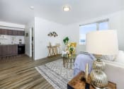 Thumbnail 6 of 57 - a living room with a couch and a table at Jefferson Yards, Washington, 98402