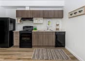 Thumbnail 1 of 57 - a kitchen or kitchenette at residence & conference centre windsor at Jefferson Yards, Tacoma, WA