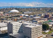 Thumbnail 54 of 57 - a cityscape with a large white building in the foreground and a large dome in the background at Jefferson Yards, Washington