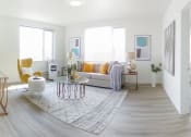 Thumbnail 20 of 57 - a living room with a couch and a table at Jefferson Yards, Washington, 98402