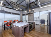 Thumbnail 19 of 57 - a kitchen and dining area in an office at Jefferson Yards, Washington