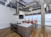 Thumbnail 18 of 57 - a kitchen and dining area in an office at Jefferson Yards, Tacoma