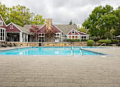 Thumbnail 45 of 48 - A pool in front of a house.
