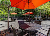 Thumbnail 9 of 48 - Outdoor Shaded Dining Table at Commons at Verandas in Tanasbourne Apartments, Hillsboro, Oregon