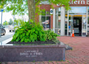 Thumbnail 7 of 10 - a tree in front of a building with a sign that says in loving memory of dancer a