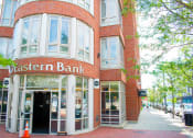 Thumbnail 5 of 10 - a large brick building with a sign that reads western bank