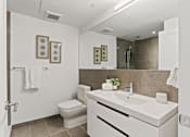 Thumbnail 7 of 33 - luxury bathroom with a sink, toilet and shower