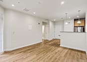 Thumbnail 2 of 33 - living room and kitchen