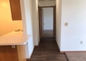 Thumbnail 18 of 21 - Kitchen with breakfast bar and hallway
