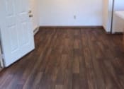 Thumbnail 16 of 21 - Large room with plank flooring