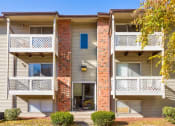 Thumbnail 1 of 12 - Exterior of building with private balconies and patios