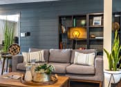 Thumbnail 5 of 27 - a living room with a couch and a coffee table