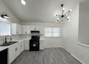 Thumbnail 2 of 26 - the preserve at ballantyne commons apartment kitchen and living room