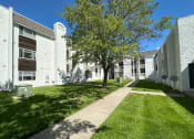 Thumbnail 11 of 12 - a view of the front of the building on a sunny day