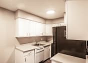 Thumbnail 12 of 23 - Kitchen with spacious cabinetry