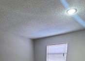 Thumbnail 14 of 16 - an empty room with carpet and a window