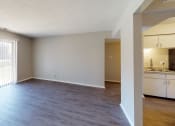 Thumbnail 15 of 17 - large open room with vinyl plank flooring
