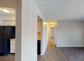 Thumbnail 13 of 17 - large open room with vinyl plank flooring