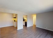 Thumbnail 12 of 17 - large open room with vinyl plank flooring