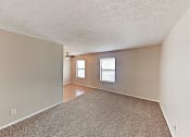 Thumbnail 4 of 15 - the living room and dining room of an empty house
