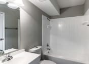 Thumbnail 7 of 7 - a bathroom with a sink toilet and a tub