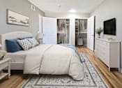 Thumbnail 7 of 25 - A bedroom with a large bed, a dresser, and a TV.