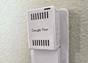Thumbnail 22 of 28 - A Google Fiber box mounted on a wall.