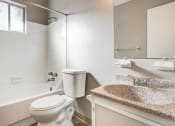 Thumbnail 12 of 12 - Bathroom with full shower and vanity