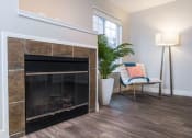 Thumbnail 3 of 18 - The Lighthouse Model Living Room with Fireplace