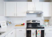 Thumbnail 5 of 18 - The Lighthouse Model Kitchen with Stainless Appliances