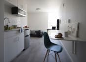 Thumbnail 9 of 33 - a kitchen and a living room in a room
