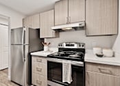 Thumbnail 4 of 27 - The Lakehouse Apartments Kitchen and Appliances