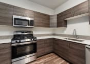 Thumbnail 3 of 44 - Prelude at Paramount Apartments Vacant Kitchen