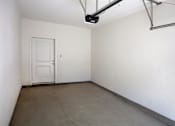 Thumbnail 35 of 35 - A room with a white door and a white wall.