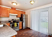 Thumbnail 19 of 36 - Parc East Apartments Staged Kitchen