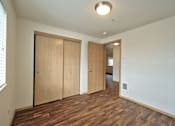 Thumbnail 22 of 36 - Parc East Apartments Bedroom and Closet Door