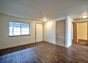 Thumbnail 20 of 36 - Parc East Apartments Living Room and Entryway
